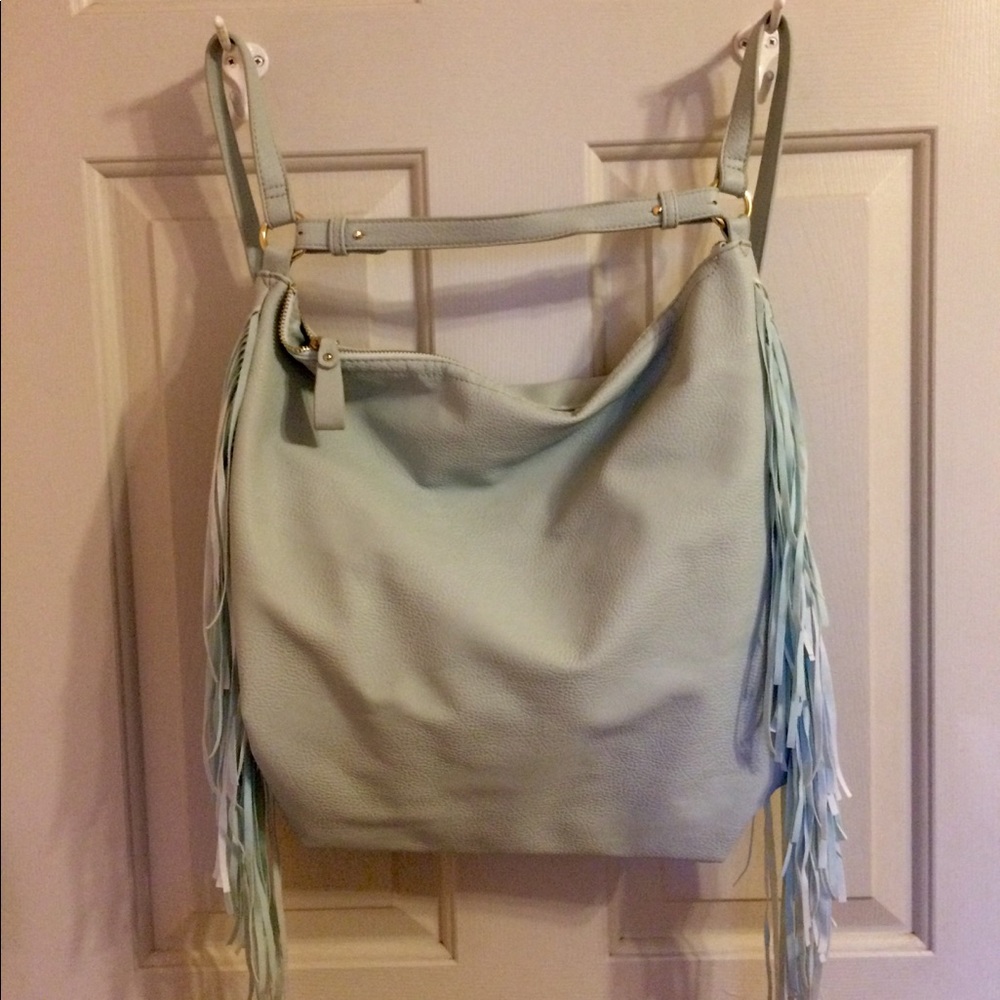 Light blue fringe backpack